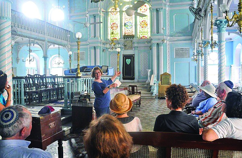 Dr. Shalva Weil of the Hebrew University of Jerusalem speaking at Bombay's 1884 Temple Knesset Eliyahoo, built by the Sassoon family, prominent Jewish philanthropists. On Burkat Global's "3000 Years of Jewish India" tour, Dr. Weil is the scholar in residence speaking daily on tour destinations. © Burkat Global, LLC